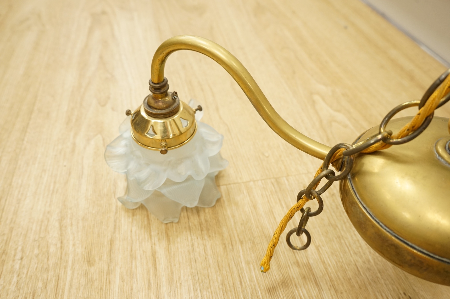 A Victorian brass three branch ceiling light with blue glass shades